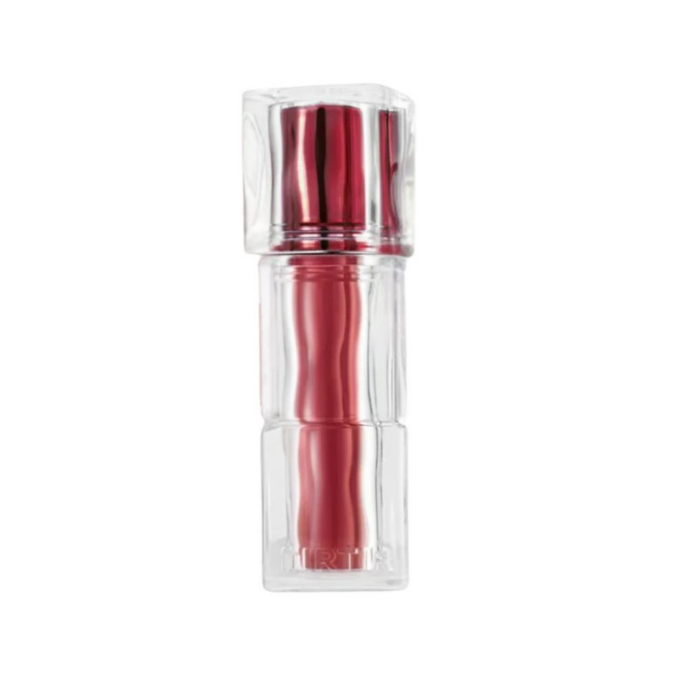 TirTir Waterism Glow Tint-21 Fig Me TirTir Mini 1,8g x 1 Esta tinta de labios ofrece un color vibrante con acabado brillante, proporcionando a los labios una apariencia jugosa y luminosa. Su fórmula ligera y no pegajosa se desliza suavemente, brindando hidr