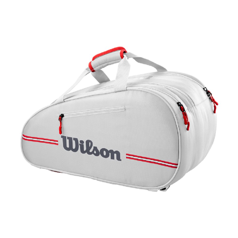 Bolso de Padel Wilson Team 6PK (BLANCO) Wilson Papeleta x 1 Bolso de Padel Wilson Team 6PK:Descubre la opción ideal para los amantes del pádel que buscan funcionalidad y estilo. Este bolso, inspirado en el legado de Wilson y diseñado con los colores emblemátic